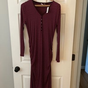 Long sleeved shin length maternity dress